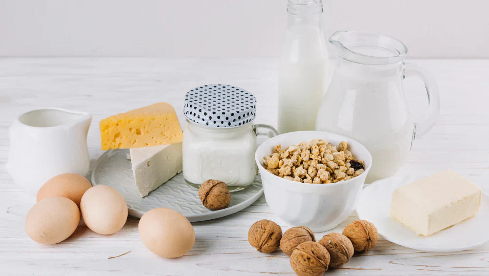 Image d'aliments riche en calcium : produits laitiers, oléagineux... 