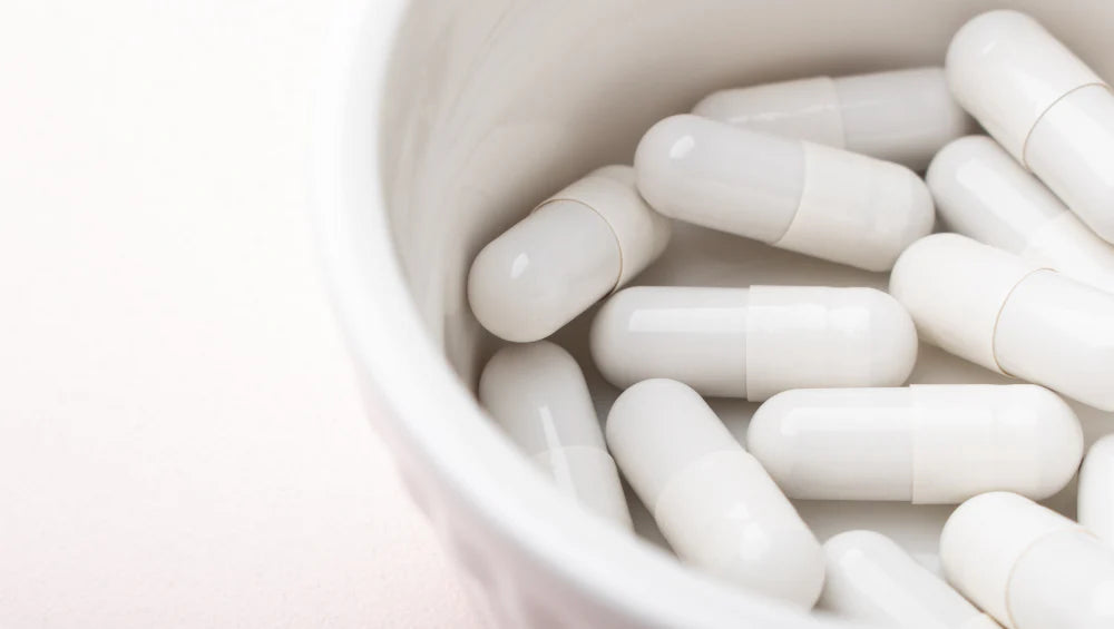 Photo de gélules de glucosamine.