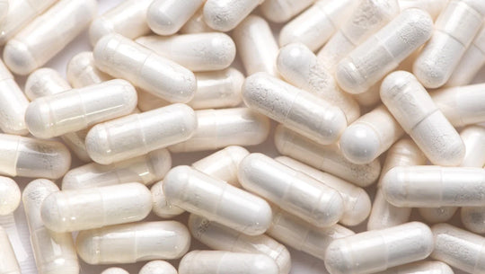 Image de gélules de vitamine D et de magnésium.