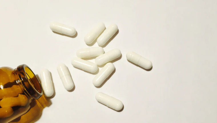 photo de sélénium oligo-element en complément alimentaire, gélules blanches